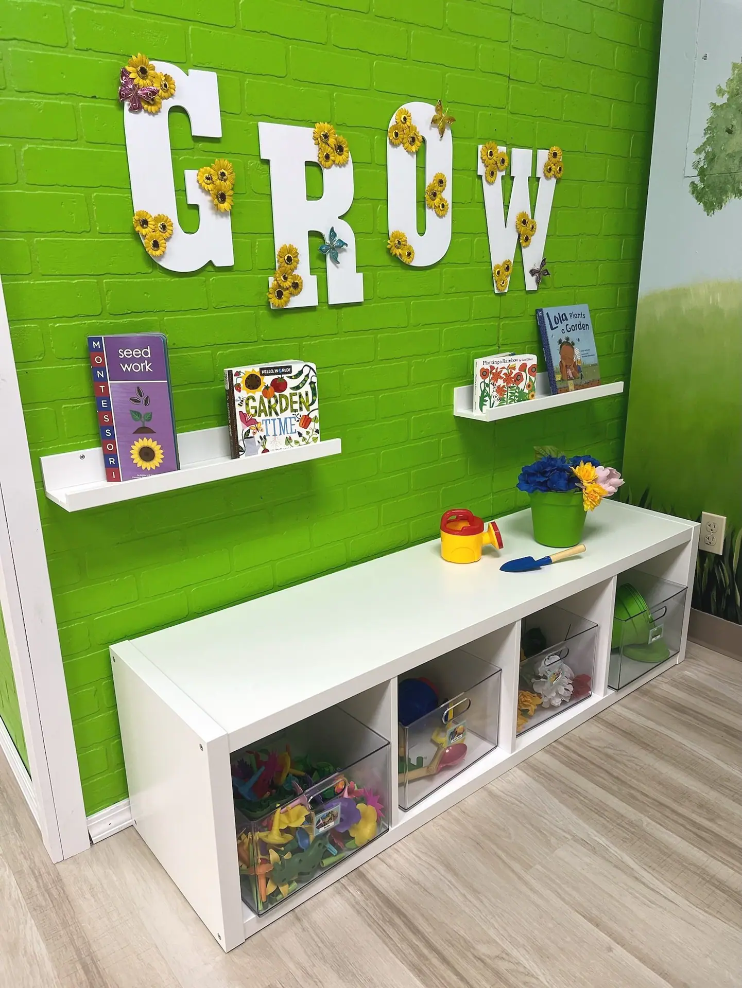 Bright pretend-play room with toy kitchen and small-world details at Your Village Play Village.