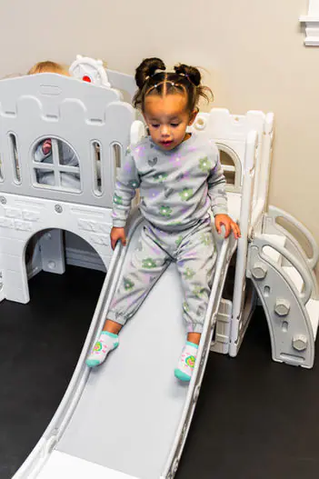 Toddler slide and small climber in the Bounce City toddler zone.