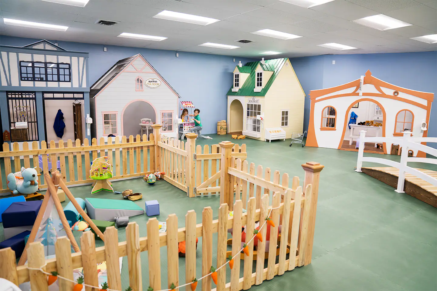 Wide view of the imaginative indoor play space at Play Away in Hackettstown.
