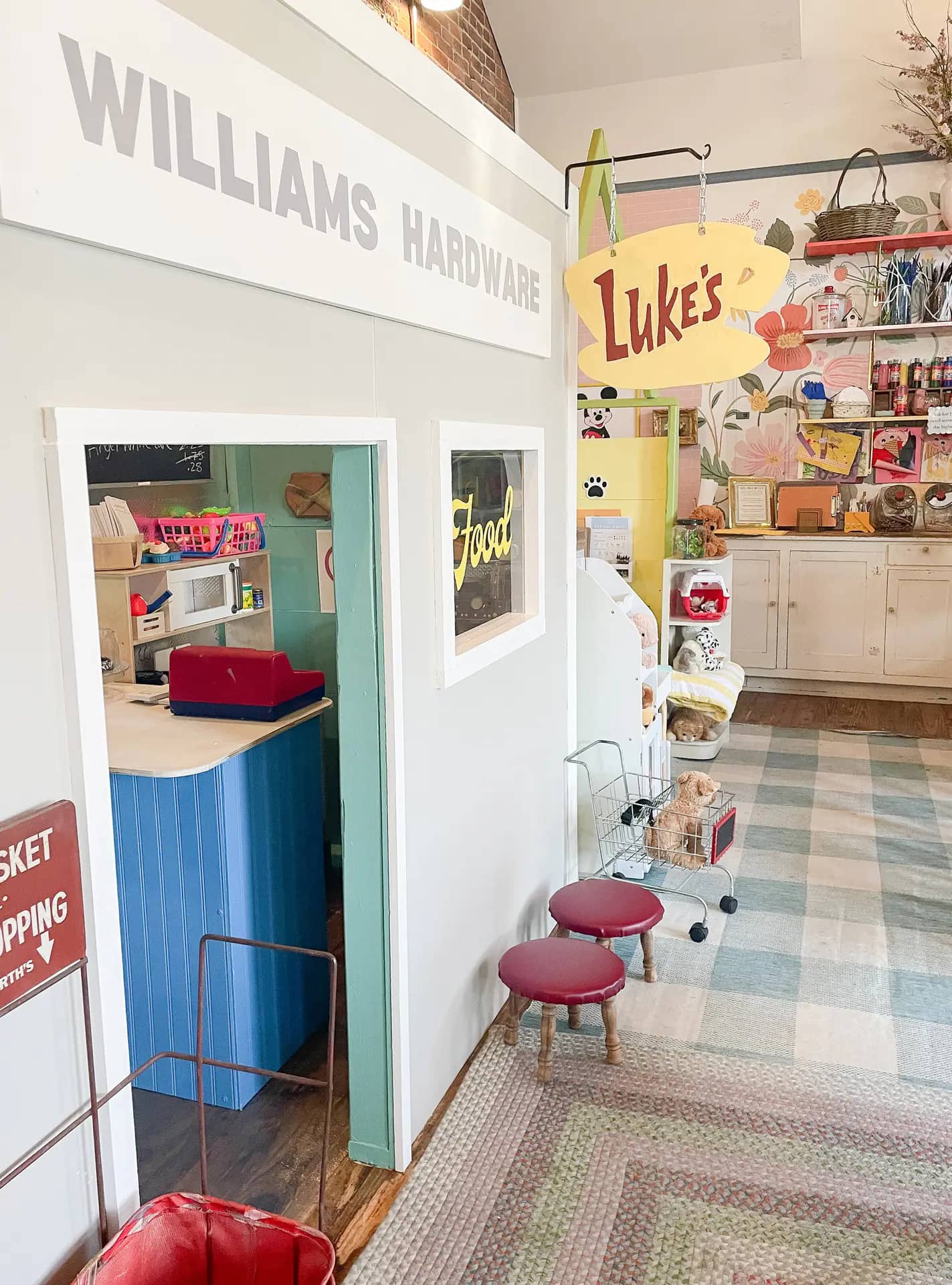 Imaginative indoor play setup at Gathered Play + Create in Versailles.