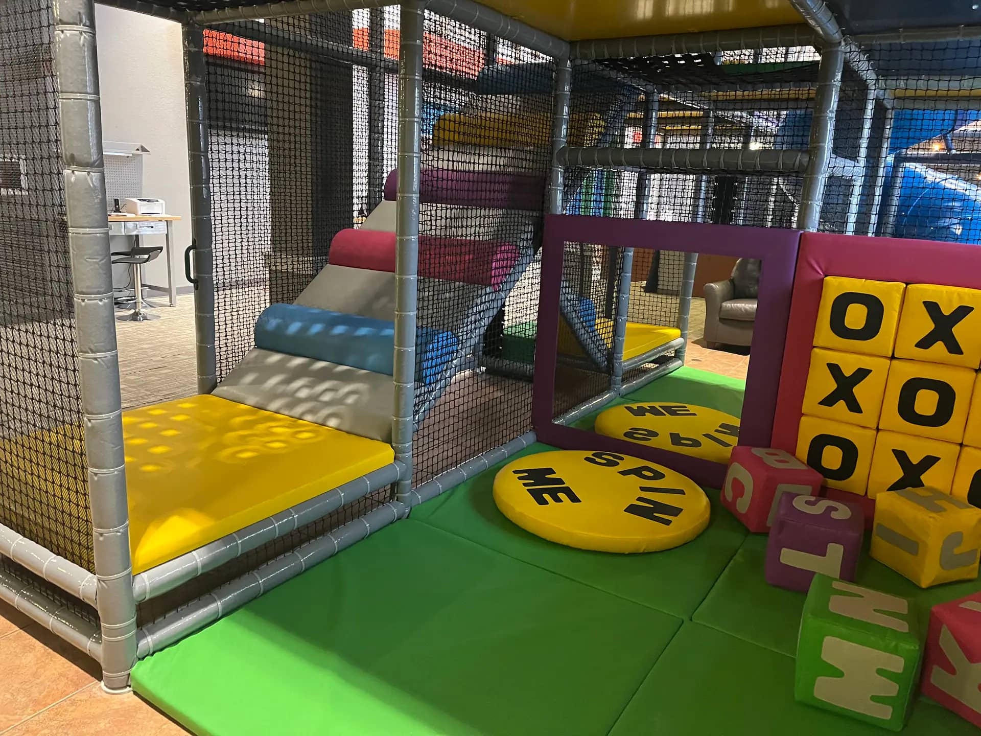 Indoor climbing and slide play area at Kidway Play Area inside Gateway Church.