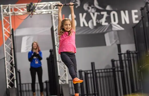 Zip line attraction used in Sky Zone promotional imagery