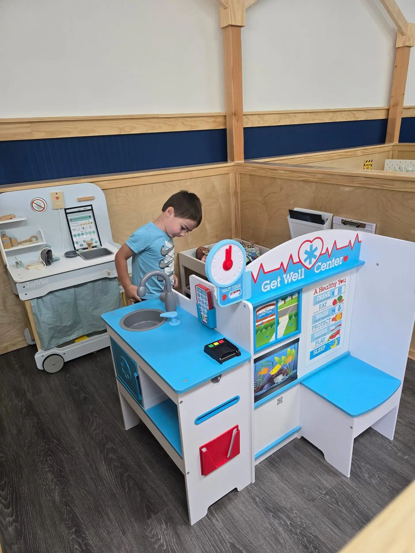 Pretend-play station inside Waddles Indoor Playground