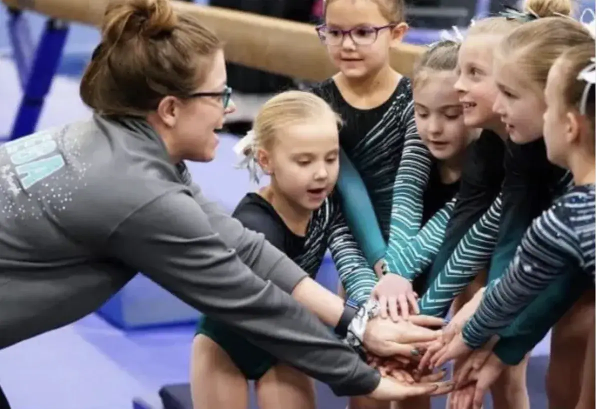 Coaching and movement inside MEGA Gymnastics & Cheer.