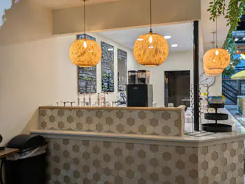 Cafe counter and caregiver amenities at The Bee's Knees Play Cafe.