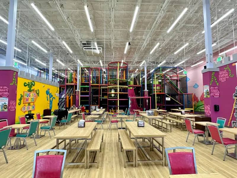 Multi-level indoor play structure at Kids Empire Kalamazoo.