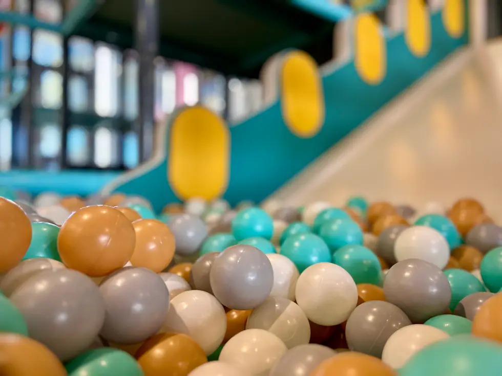 Ball pit and slide area at Sunshine Play Cafe.