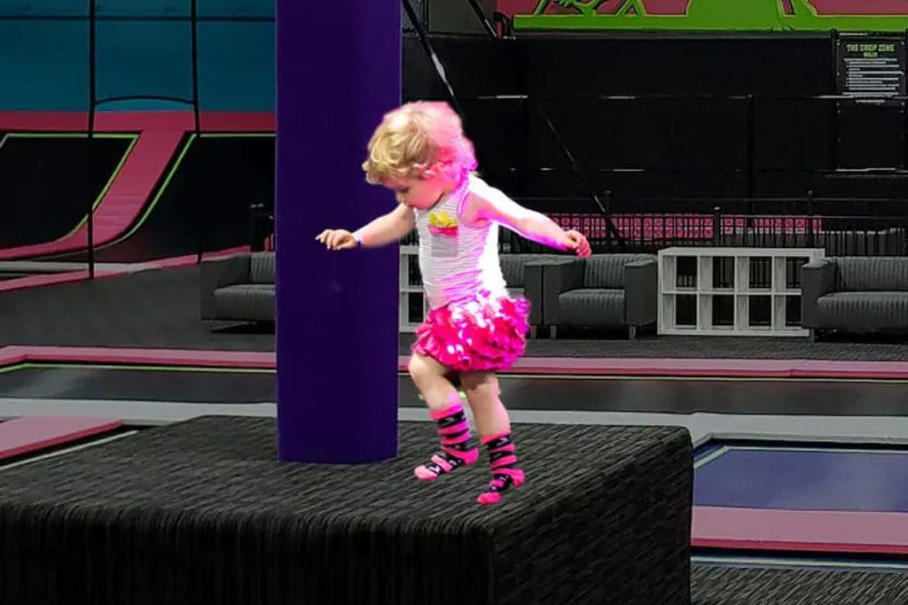 Young child using a toddler jump area at Flying Squirrel Moscow.