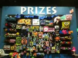 Prize wall at Jump-N-Joey's arcade area.