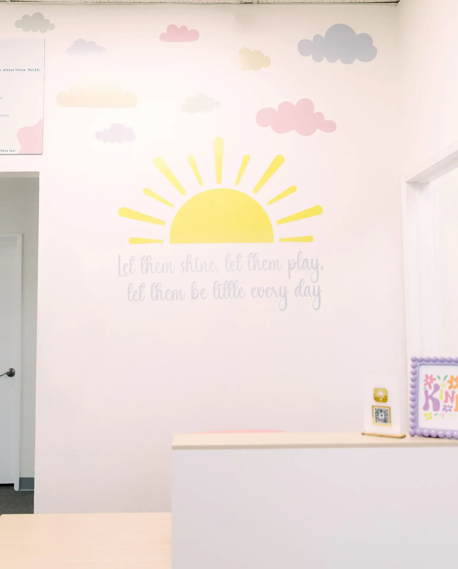 Bright front desk and welcome area inside Tiny Toddler Soft Play.