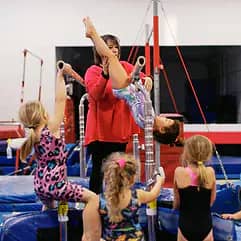 Children using gymnastics equipment at Mismo.